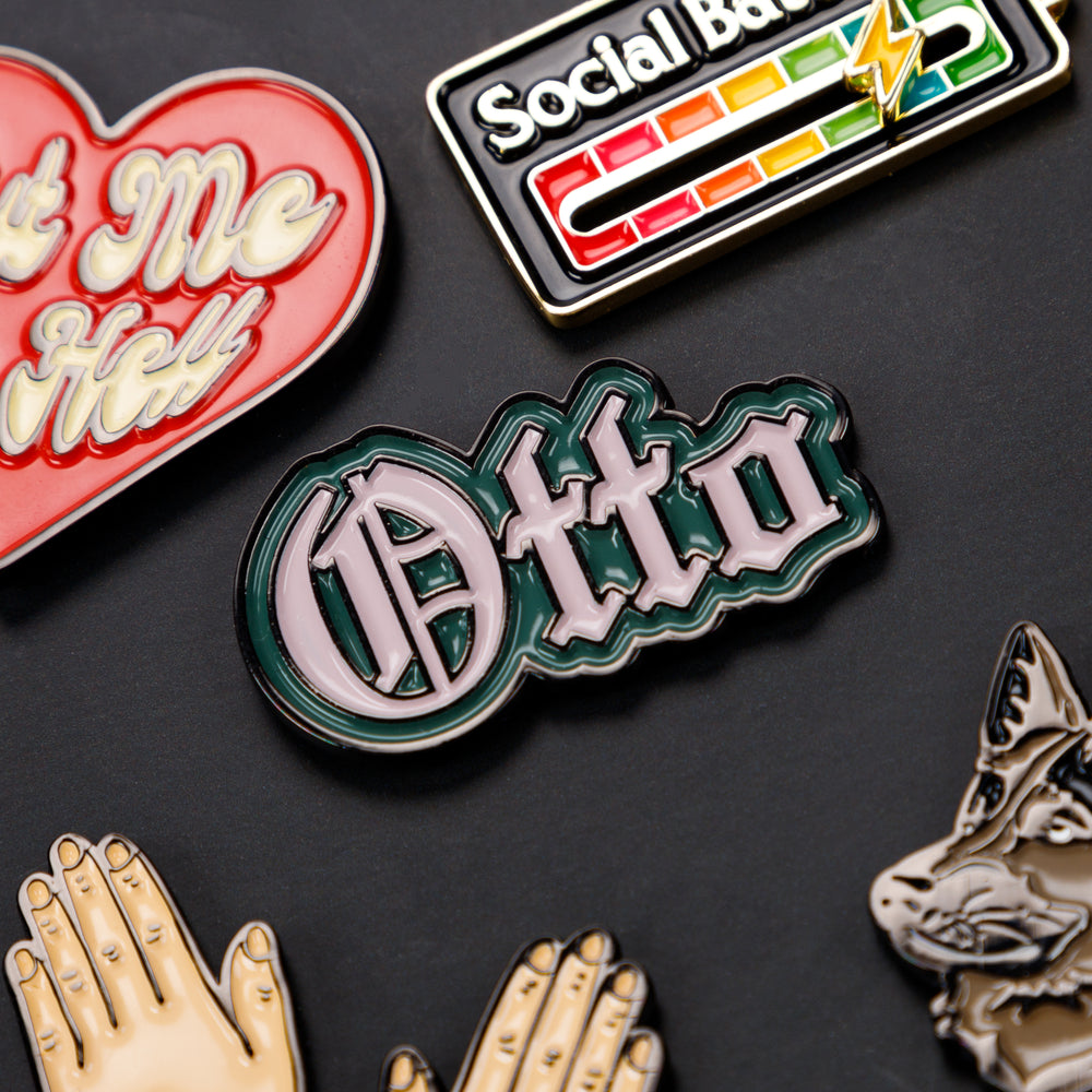 
                      
                        Otto Enamel Pins Set
                      
                    